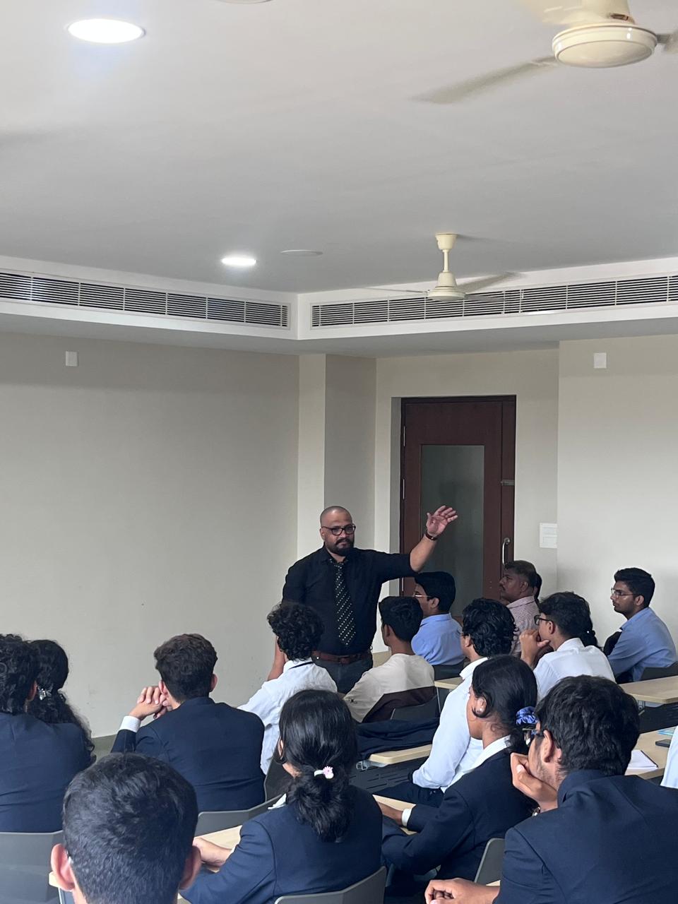 Speaker interacting with students